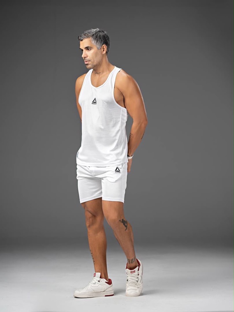 ست تاپ قهرمانی و شلوارک ورزشی مردانه Reebok | جنس سوزنی تنفسی (M تا 2XL)